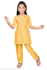Yellow Chanderi cotton embroidered kurta set for girls, traditional Indian attire with three-quarter sleeves and knee-length tops